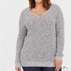 Tunic length cross strap sweater